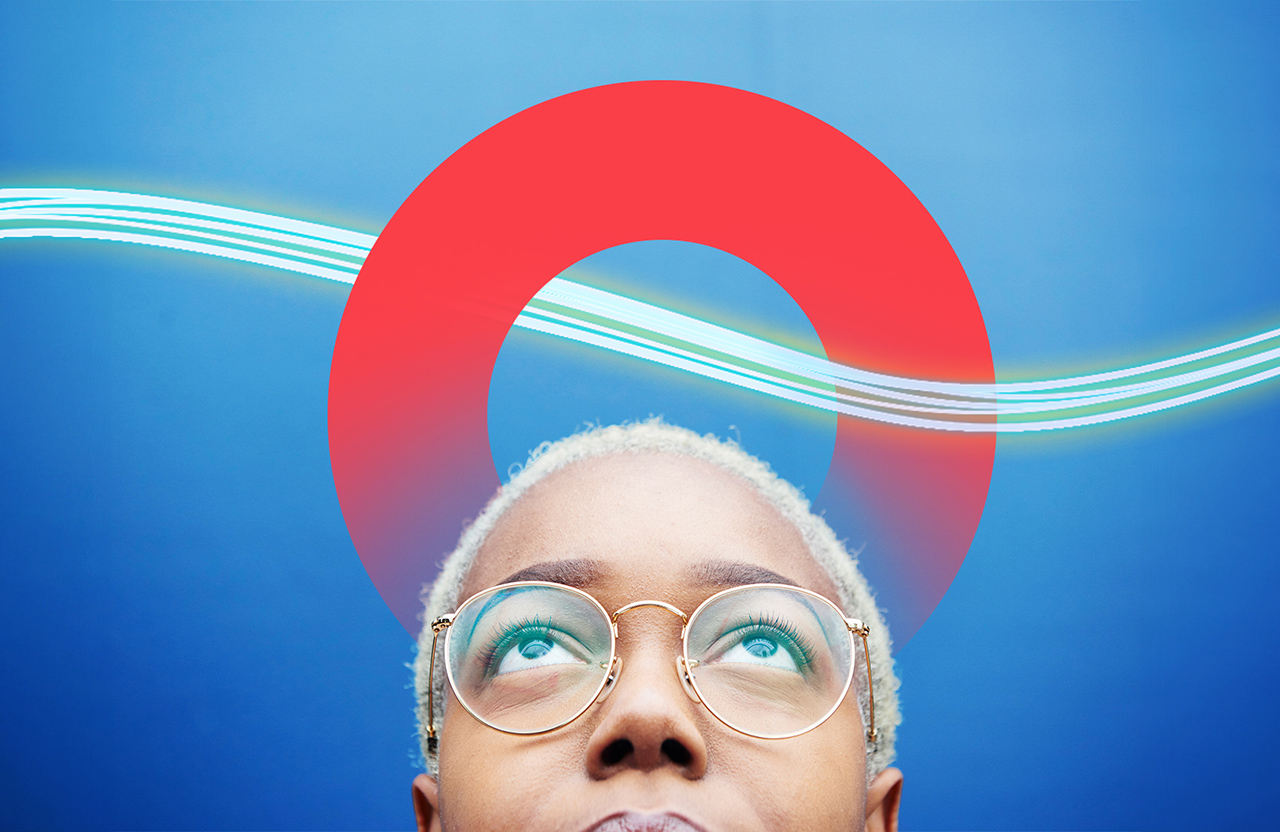 Woman wearing glasses looking up