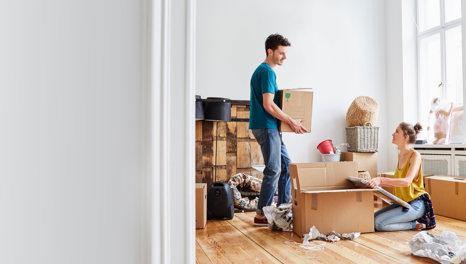 People packing and moving boxes