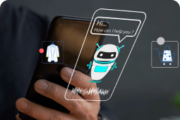 Person holding a mobile with a chatbot conversation illustration