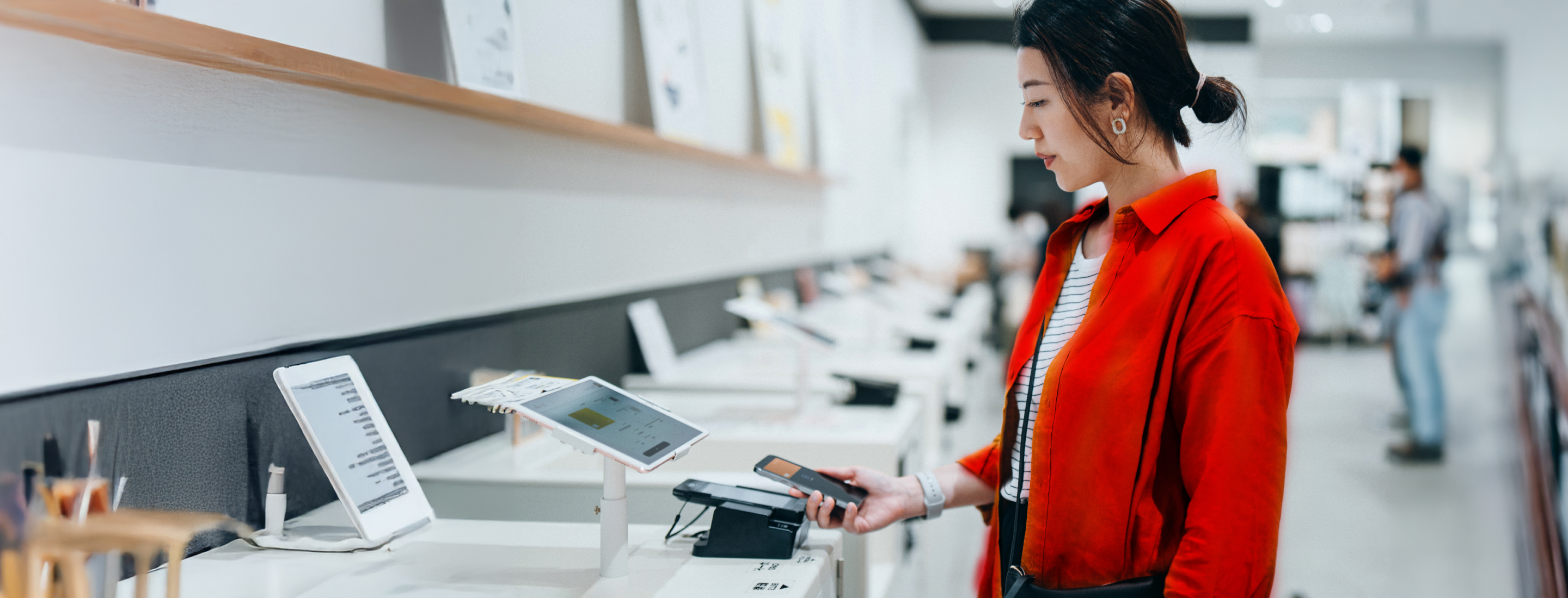 woman using mobile device to scan screen